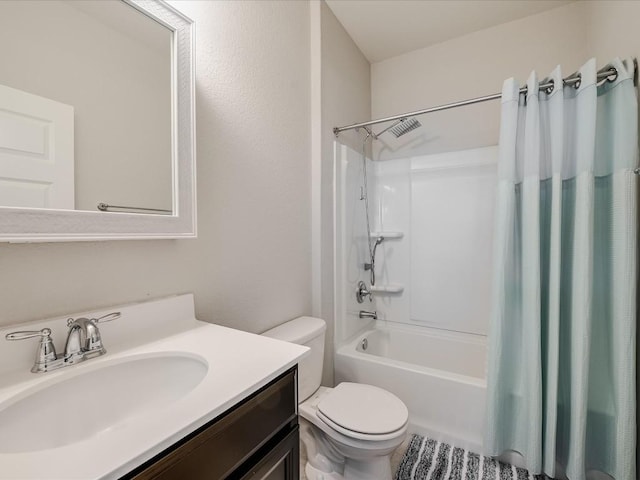 bathroom featuring toilet, shower / bathtub combination with curtain, and vanity