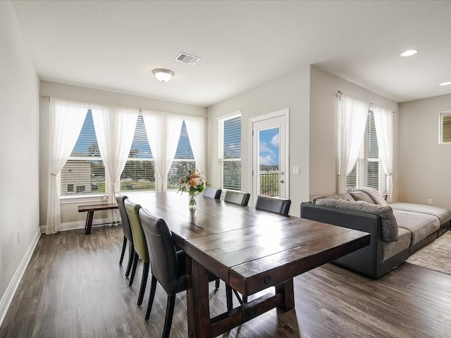 dining area with recessed lighting, dark wood-style flooring, visible vents, and baseboards