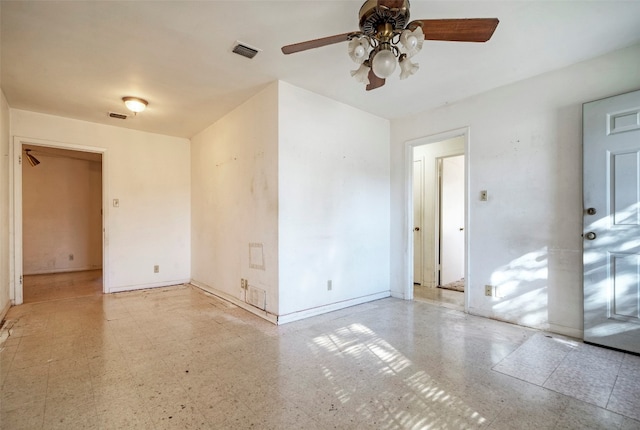 unfurnished room with ceiling fan