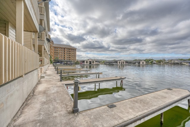 dock area featuring a water view