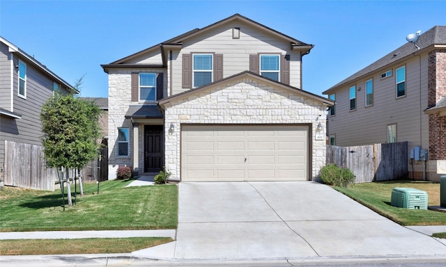 view of front property with a front lawn and a garage