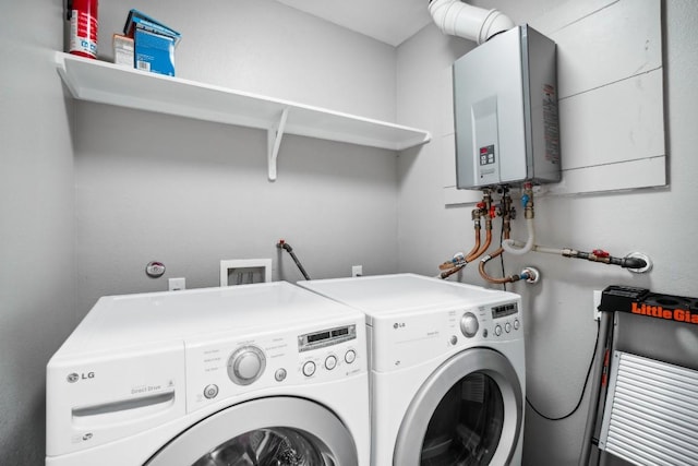 503 Swanee Dr Unit 19, Austin, TX 78752 - washroom featuring tankless water heater and washer and clothes dryer