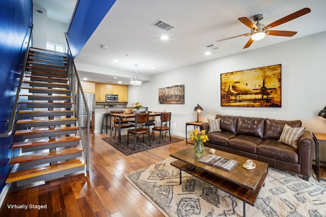 503 Swanee Dr Unit 19, Austin, TX 78752 - living room featuring stairway, a ceiling fan, light wood finished floors, and recessed lighting