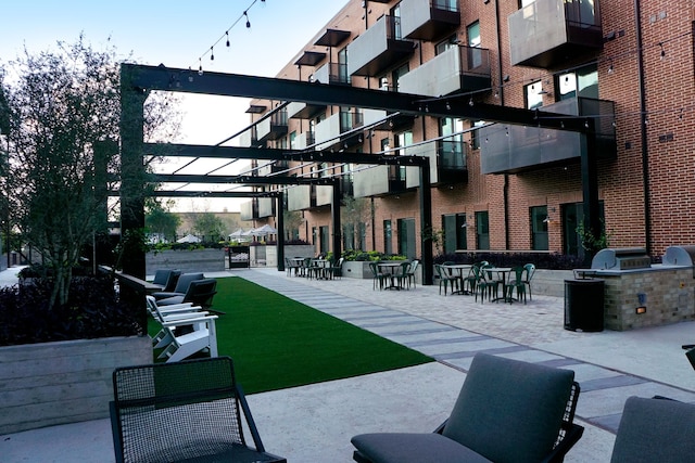 view of property's community featuring exterior kitchen