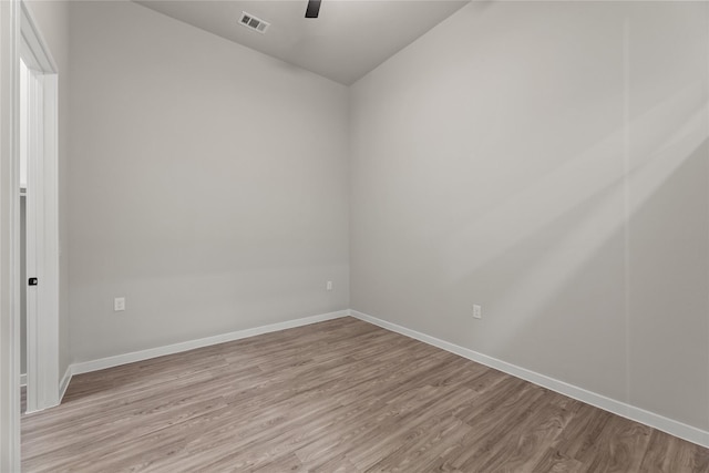 unfurnished room with ceiling fan and light hardwood / wood-style flooring