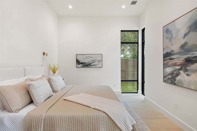 bedroom featuring light hardwood / wood-style flooring