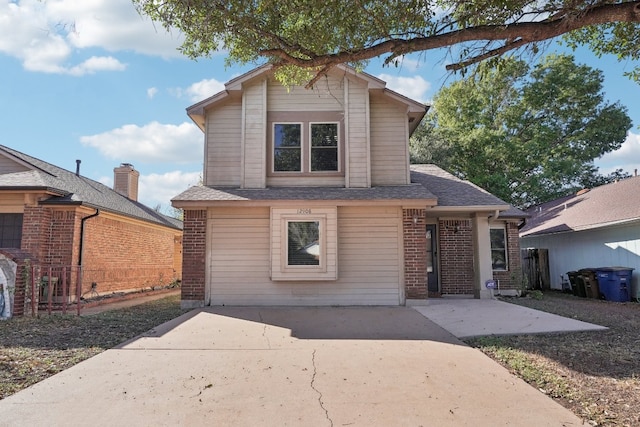 front of property with a patio