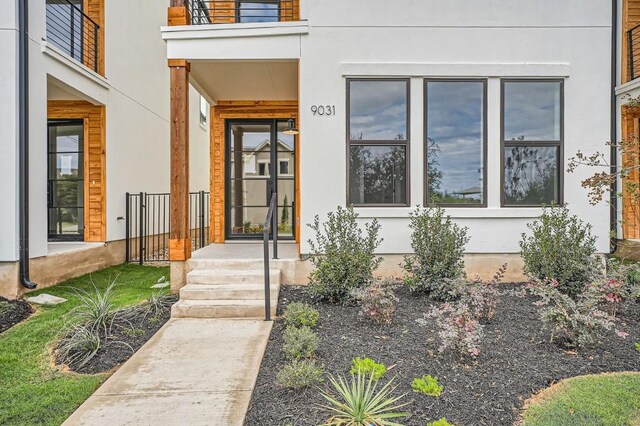 9031 Cattle Baron Path, Austin, TX 78747 - property entrance with stucco siding