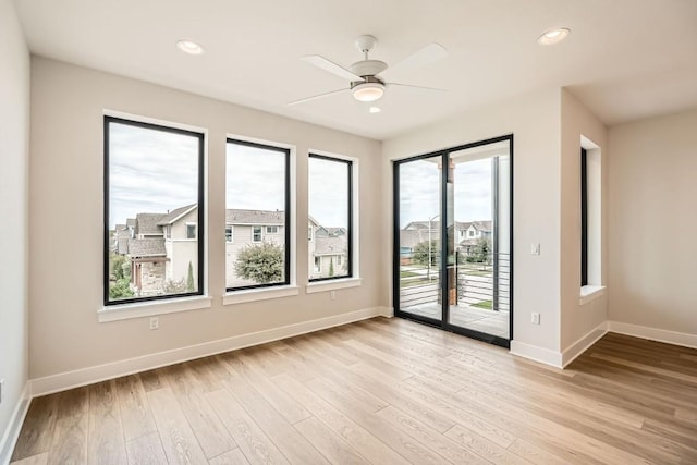 9031 Cattle Baron Path, Austin, TX 78747 - unfurnished room with light wood finished floors, baseboards, recessed lighting, and a ceiling fan