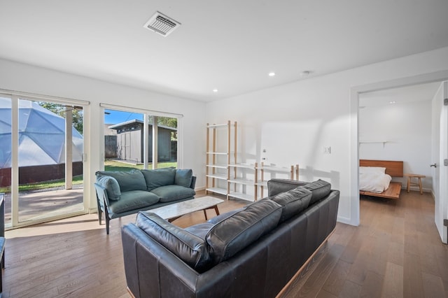 living room with dark wood-type flooring