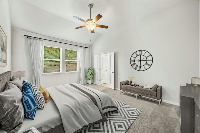 bedroom featuring lofted ceiling, carpet, and ceiling fan