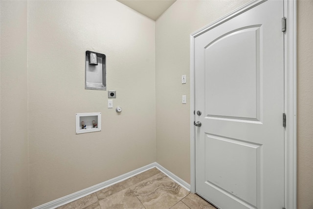 laundry area with gas dryer hookup, hookup for a washing machine, light tile patterned floors, and hookup for an electric dryer