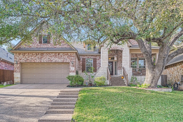 view of front facade with a garage and a front yard