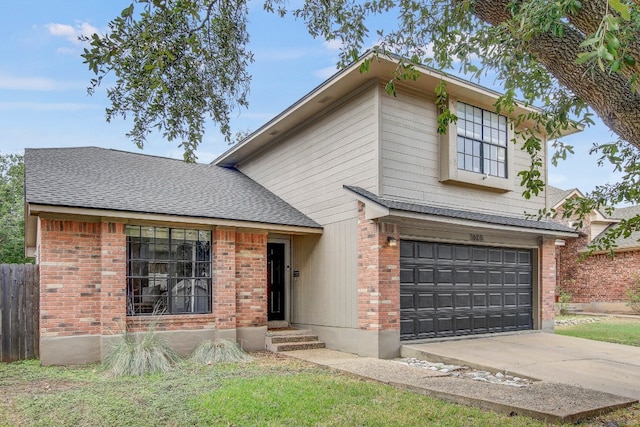 view of front of home with a garage