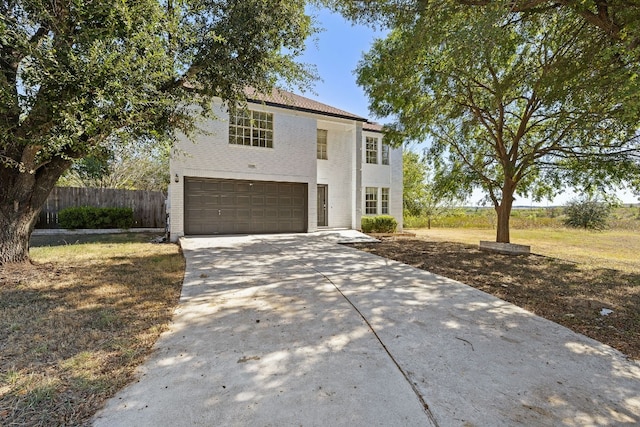 view of front of property with a garage