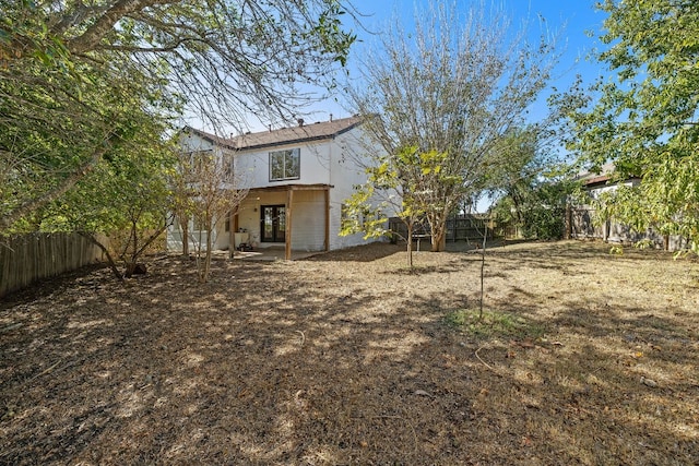 back of property featuring a patio area