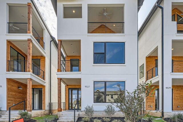 modern home featuring a balcony