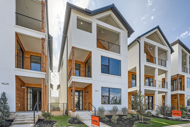 contemporary home with a balcony