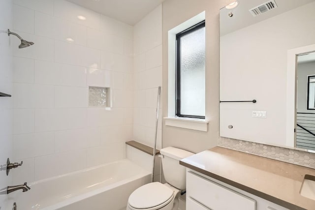 9027 Cattle Baron Path, Austin, TX 78747 - bathroom featuring plenty of natural light, vanity, and shower / tub combination