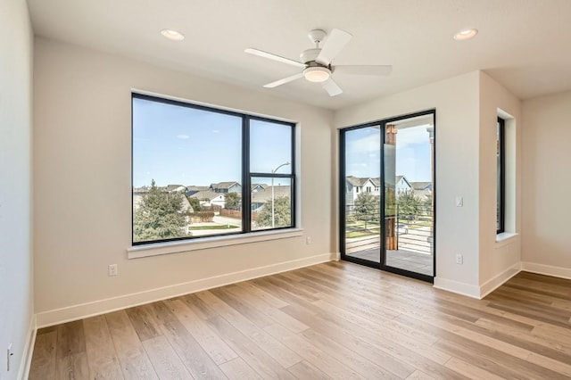9027 Cattle Baron Path, Austin, TX 78747 - spare room with light wood finished floors, recessed lighting, and ceiling fan