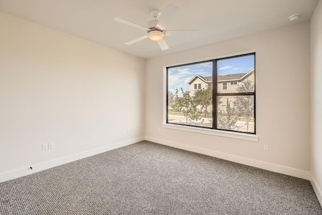 9027 Cattle Baron Path, Austin, TX 78747 - unfurnished room with carpet, a ceiling fan, and a smoke detector