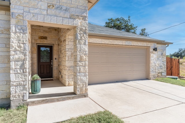 entrance to property featuring a garage