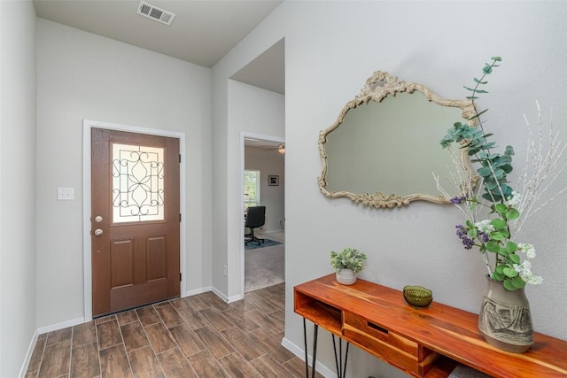 4303 Lindberg Ln, Lago Vista, TX 78645 - foyer featuring dark wood-style flooring and baseboards