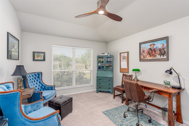 carpeted office featuring vaulted ceiling and ceiling fan