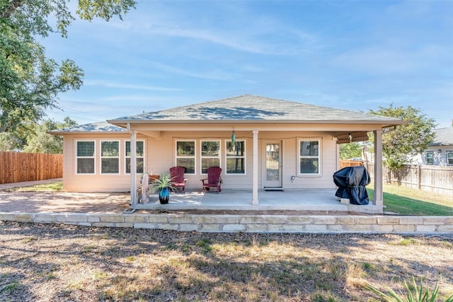 4303 Lindberg Ln, Lago Vista, TX 78645 - back of property with covered porch and roof with shingles