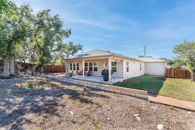 4303 Lindberg Ln, Lago Vista, TX 78645 - back of property with a patio