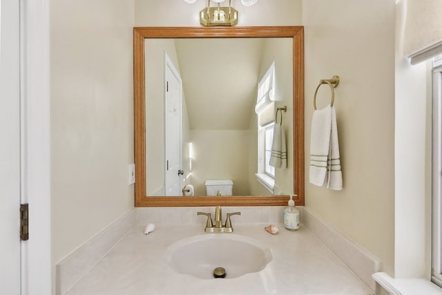 bathroom featuring toilet and sink