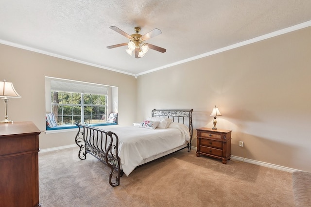 carpeted bedroom with ornamental molding, a textured ceiling, and ceiling fan