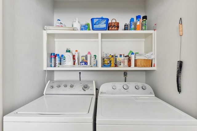 laundry room with independent washer and dryer