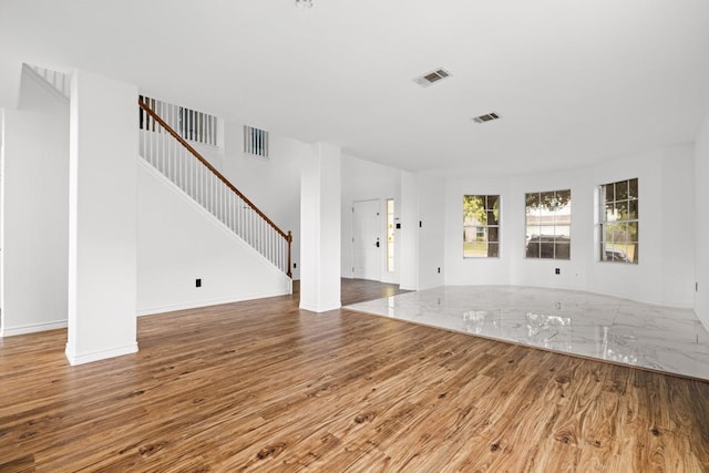 interior space with hardwood / wood-style flooring