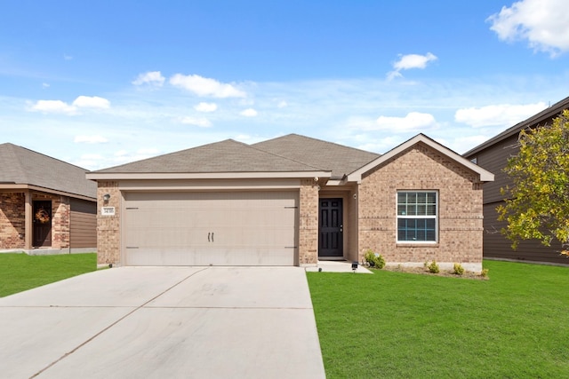 view of front of home with a garage and a front yard