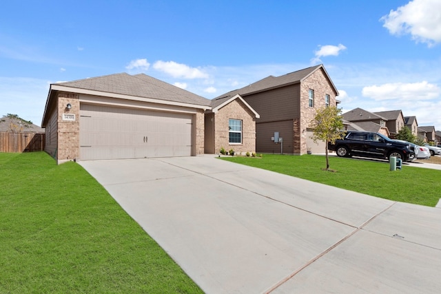 view of front facade with a garage and a front yard