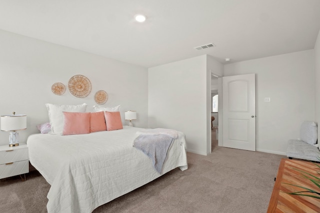 bedroom featuring carpet