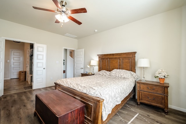 bedroom featuring ceiling fan and dark hardwood / wood-style floors