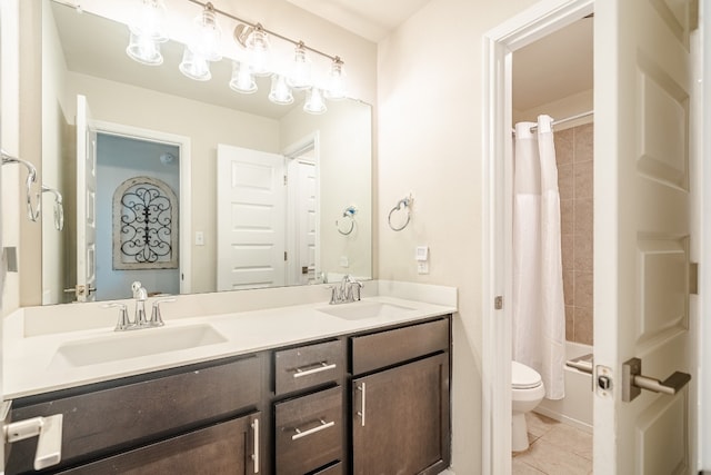 full bathroom with toilet, shower / bath combo, vanity, and tile patterned flooring