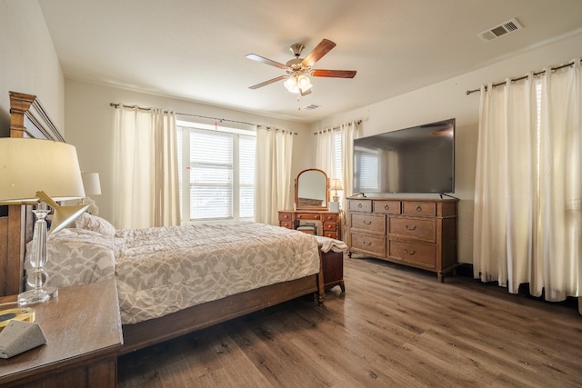 bedroom featuring hardwood / wood-style flooring and ceiling fan