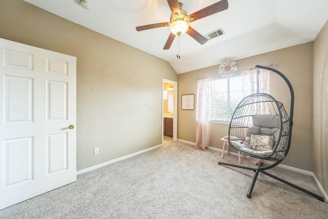 unfurnished room featuring ceiling fan, light colored carpet, and lofted ceiling