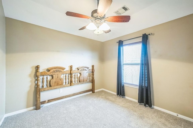 bedroom featuring ceiling fan and carpet flooring