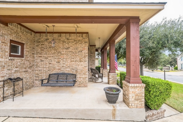 view of patio featuring a porch