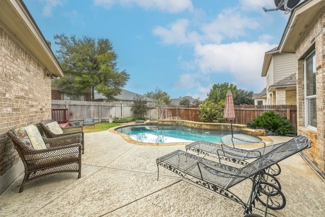 view of pool with a patio