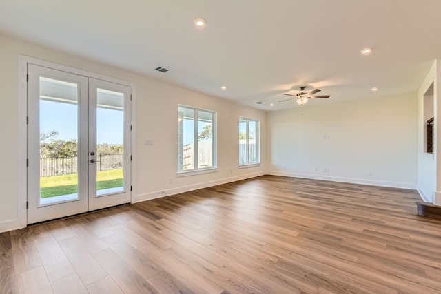 interior space with ceiling fan, light hardwood / wood-style flooring, and french doors