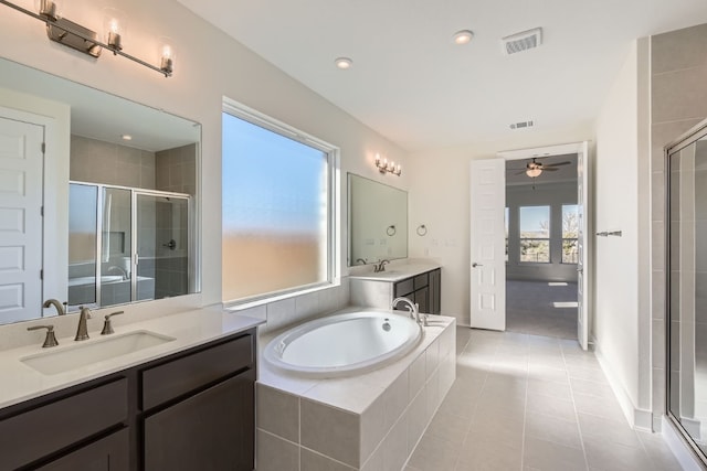 bathroom featuring tile patterned floors, ceiling fan, vanity, and shower with separate bathtub