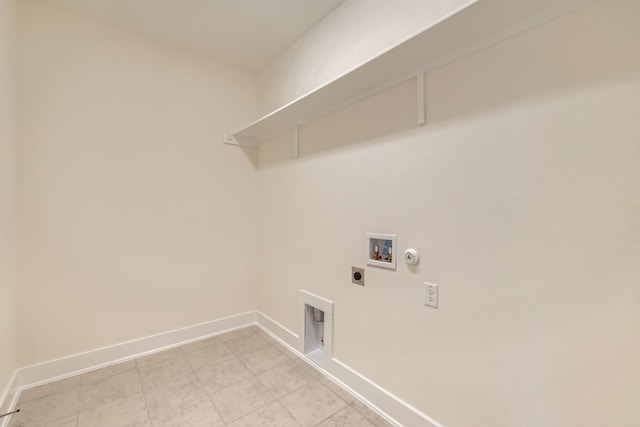 laundry area with hookup for an electric dryer, hookup for a gas dryer, and washer hookup