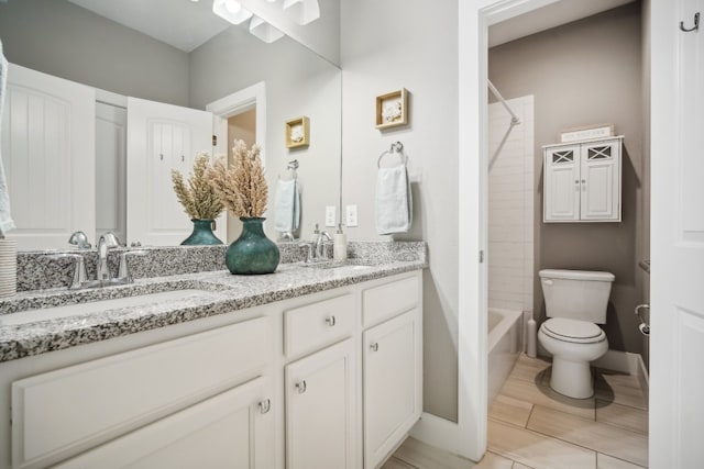 full bathroom featuring tiled shower / bath, hardwood / wood-style floors, vanity, and toilet