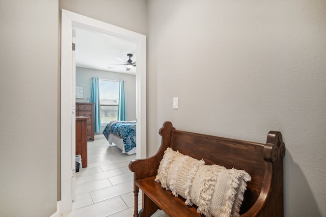 bedroom featuring light tile patterned floors