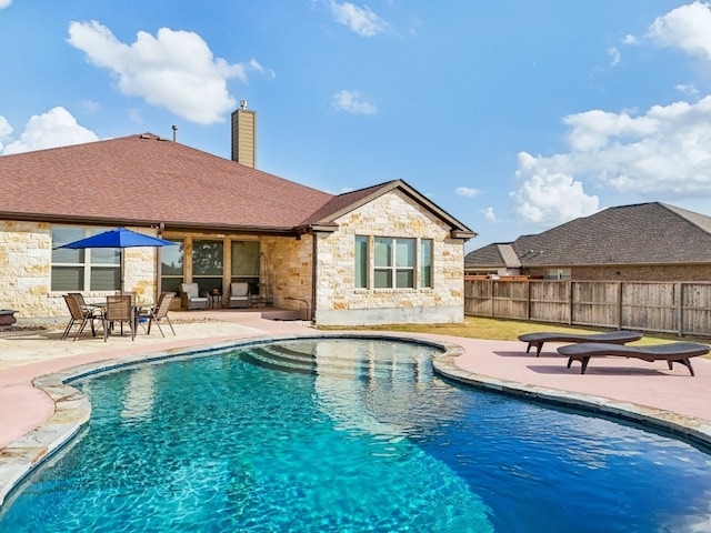 view of pool with a patio